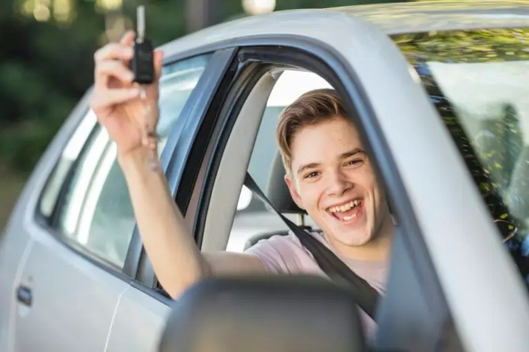 happy-learner-driver-cheering-and-holding-car-key